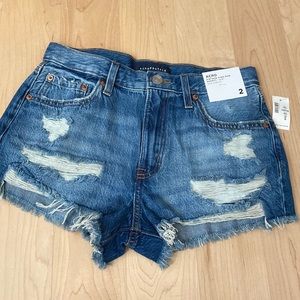 Jean shorts, size 2, blue Jean shorts ripped.